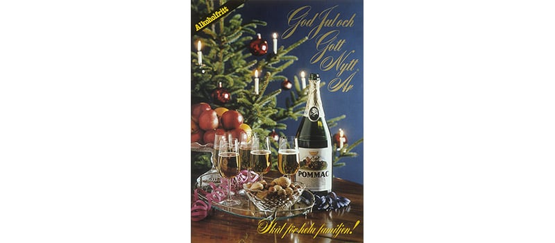 Affisch, "God Jul och gott nytt år" Alkoholfria sortimentet. Champagneglas och Pommac-flaska. Tidpunkt: 1980; Deponent: Systembolaget / Systembolaget AB; Motiv-ID: DA-2015-089557-SYS000836